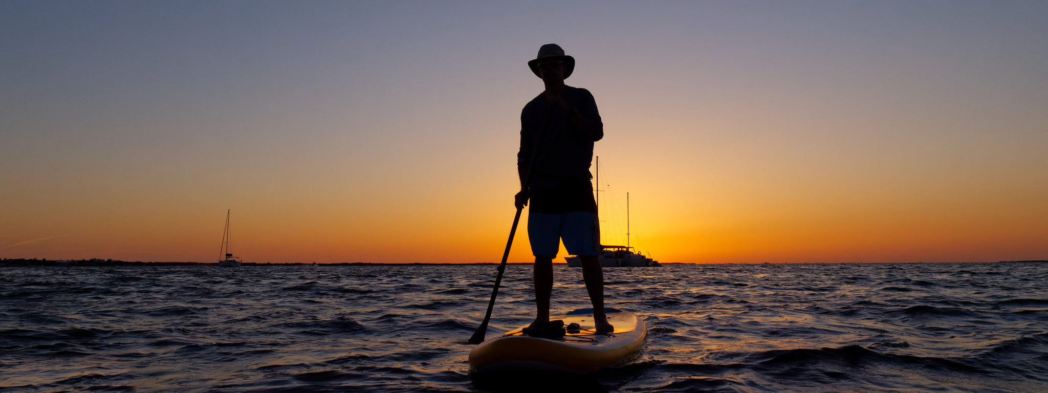 Paddler on an inflatable SUP board